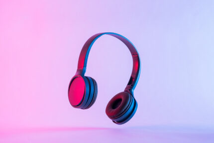 Headphones in neon pastel lighting