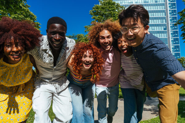 Group of young people outside having fun